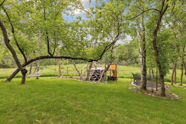 view of yard featuring a trampoline