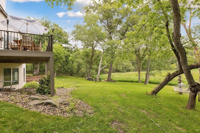 view of yard featuring a deck