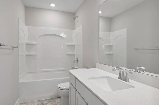 bathroom featuring vanity, recessed lighting, toilet, marble finish floor, and shower / bathtub combination