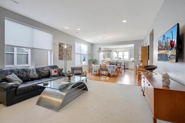 living room featuring recessed lighting and wood finished floors