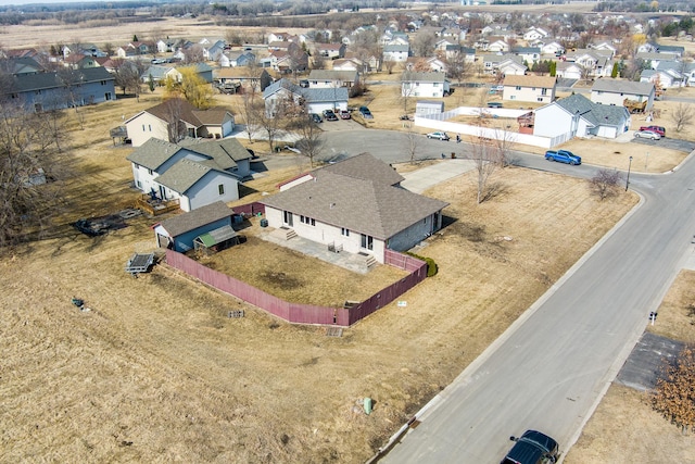 birds eye view of property with a residential view