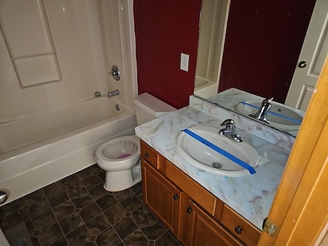 bathroom with toilet, bathtub / shower combination, vanity, and tile patterned flooring