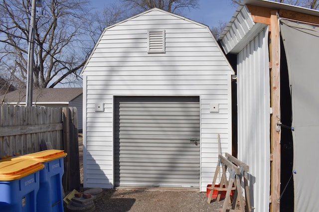 garage with fence