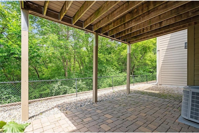 view of patio with a fenced backyard and central AC