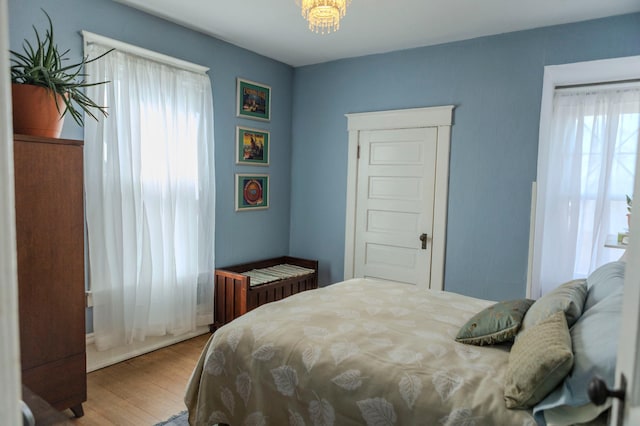 bedroom featuring wood finished floors