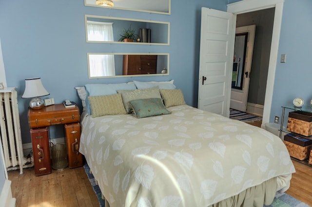 bedroom featuring wood finished floors