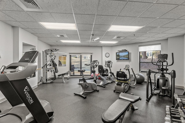 6615 Lake Shore Dr S Unit 515, Richfield, MN 55423 - gym featuring a paneled ceiling and a baseboard radiator