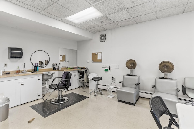 6615 Lake Shore Dr S Unit 515, Richfield, MN 55423 - miscellaneous room featuring a sink, baseboard heating, a drop ceiling, and light flooring