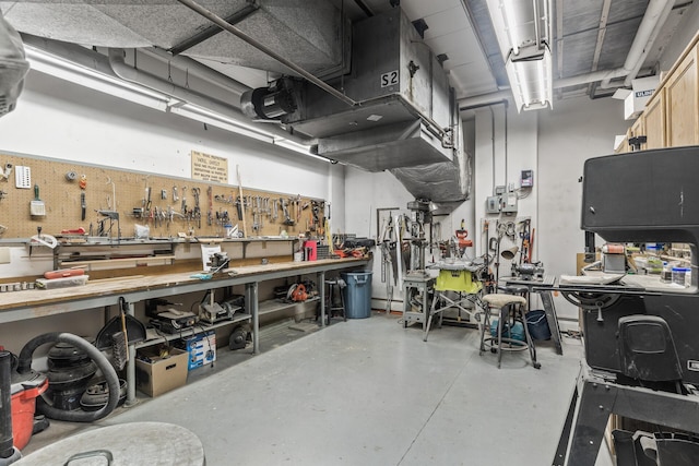 6615 Lake Shore Dr S Unit 515, Richfield, MN 55423 - garage with a workshop area and a garage door opener