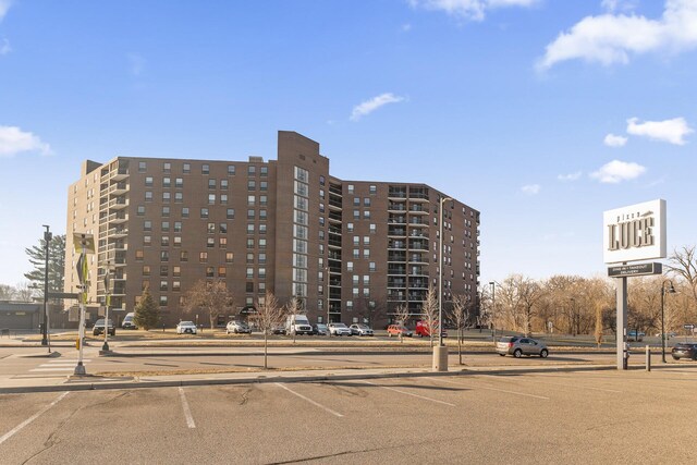 6615 Lake Shore Dr S Unit 515, Richfield, MN 55423 - view of apartment building / complex with uncovered parking