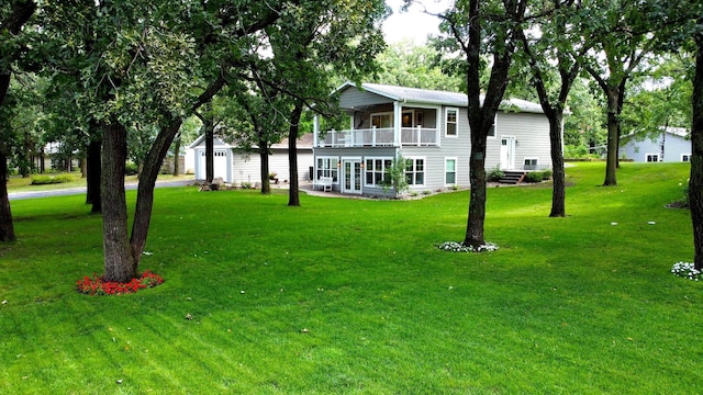 114 Bay View Rd, Otter Tail Twp, MN 56571 - view of grassy yard with a balcony