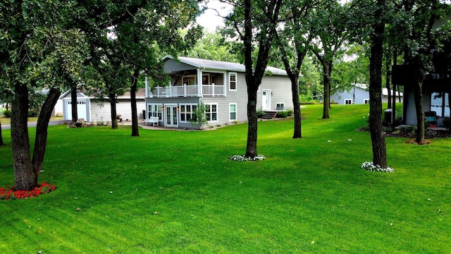 114 Bay View Rd, Otter Tail Twp, MN 56571 - view of green lawn with a balcony and french doors
