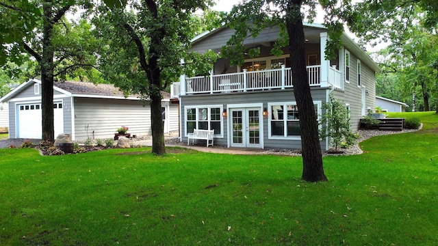 114 Bay View Rd, Otter Tail Twp, MN 56571 - back of house with french doors, a yard, a balcony, and an outbuilding