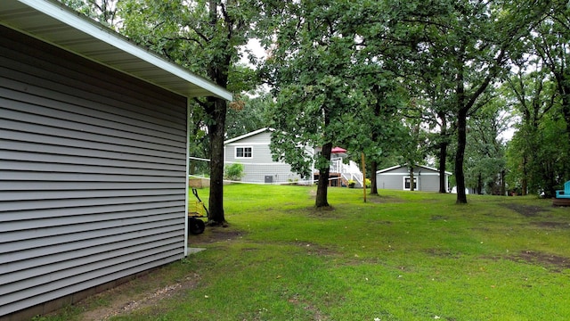114 Bay View Rd, Otter Tail Twp, MN 56571 - view of grassy yard featuring an outdoor structure