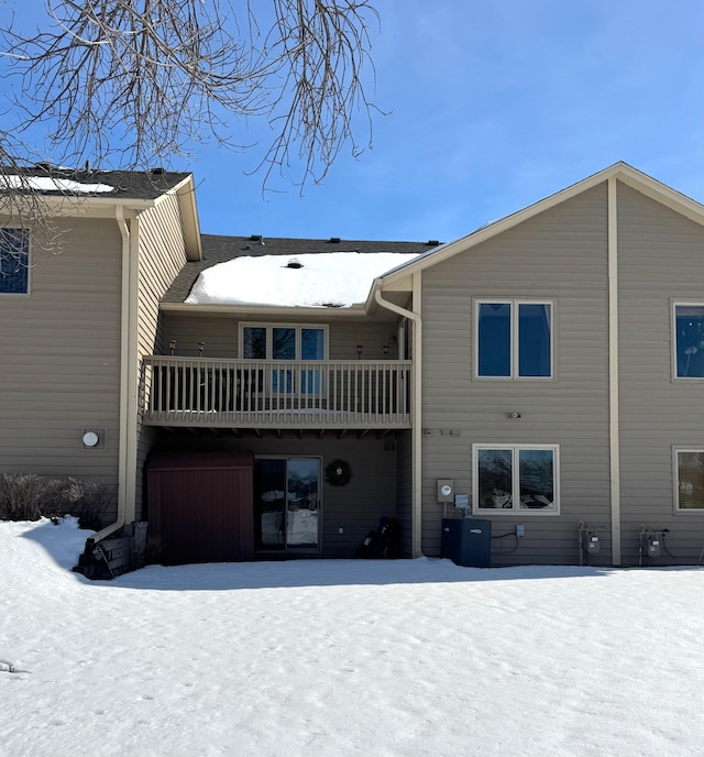 view of snow covered house