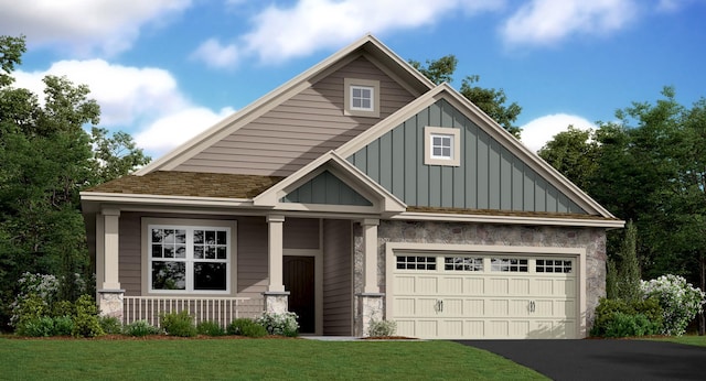 craftsman-style house with a front lawn, aphalt driveway, roof with shingles, board and batten siding, and a garage