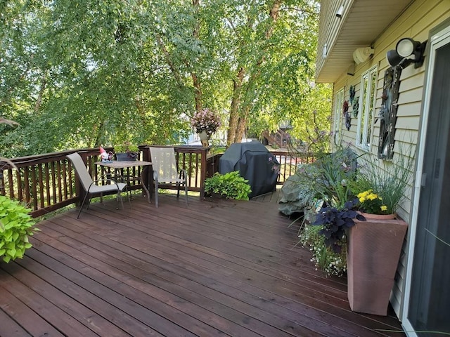 wooden deck with grilling area