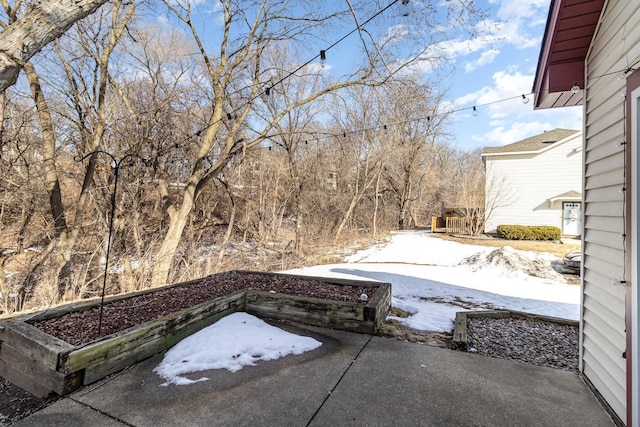 view of snow covered patio