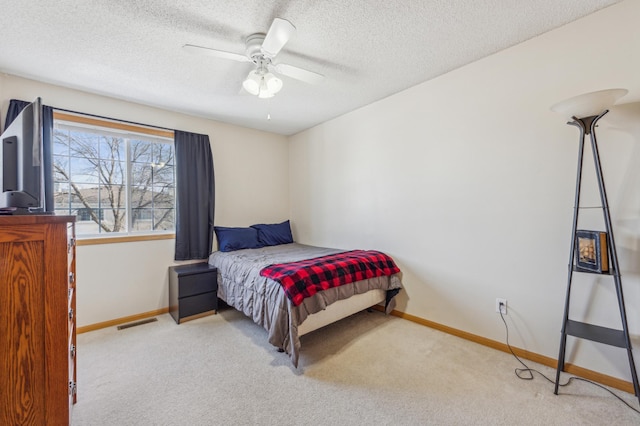 bedroom with visible vents, baseboards, and carpet floors