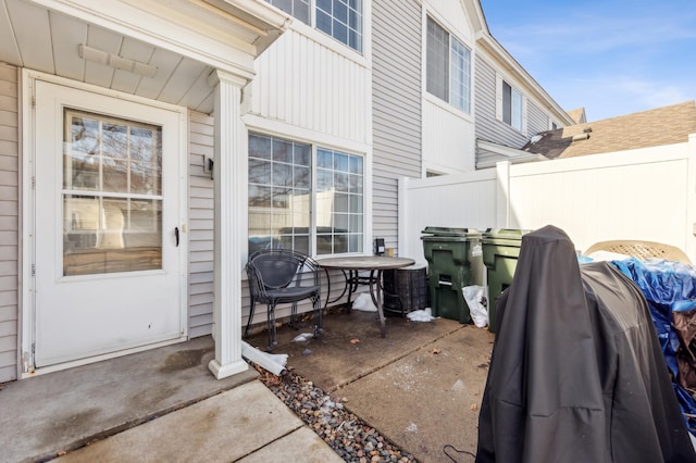 view of patio featuring fence