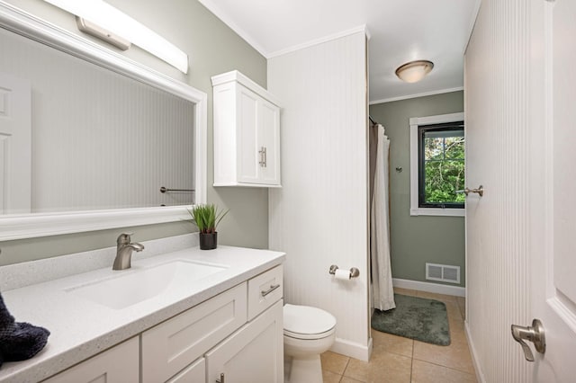 bathroom with visible vents, crown molding, toilet, tile patterned floors, and vanity