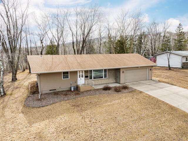 ranch-style house featuring cooling unit, roof with shingles, crawl space, driveway, and a garage