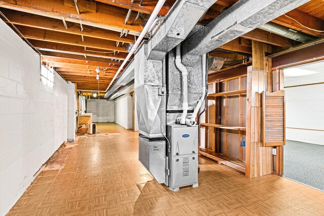unfinished basement with concrete block wall