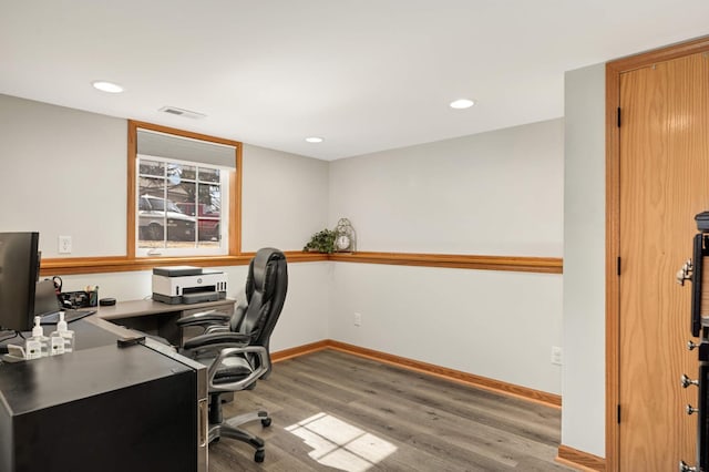 home office featuring visible vents, recessed lighting, light wood-type flooring, and baseboards