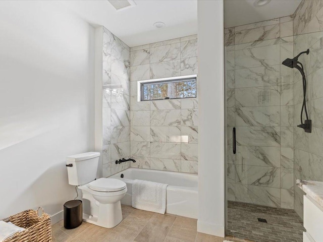 full bathroom with tiled shower / bath combo, toilet, and baseboards