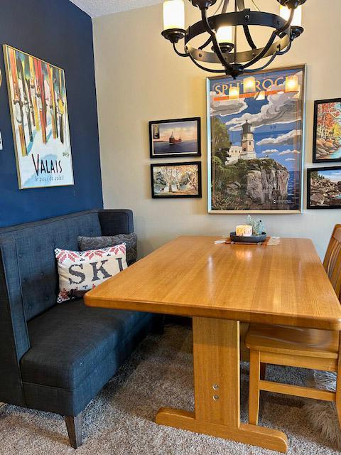 dining area with a notable chandelier