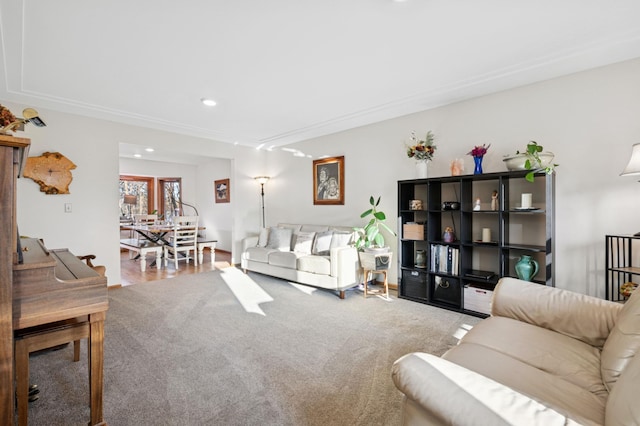 carpeted living room with recessed lighting