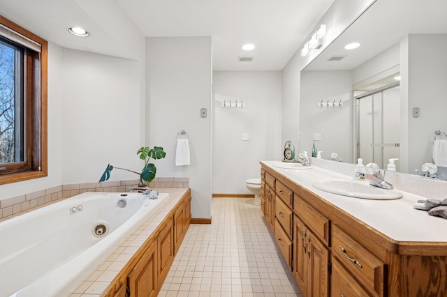 full bathroom featuring double vanity, a whirlpool tub, a sink, tile patterned flooring, and a shower stall