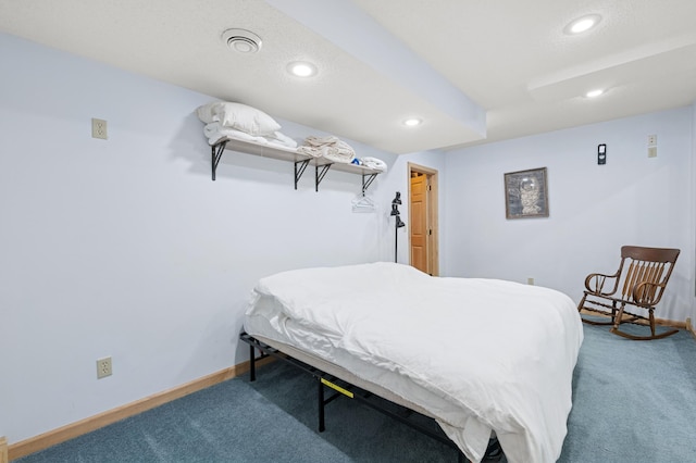 carpeted bedroom featuring recessed lighting and baseboards