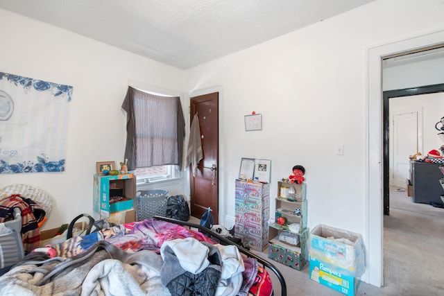 bedroom featuring a textured ceiling