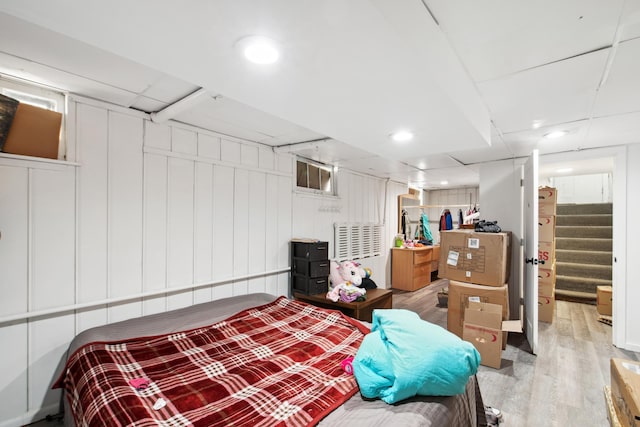 bedroom featuring recessed lighting and light wood-type flooring