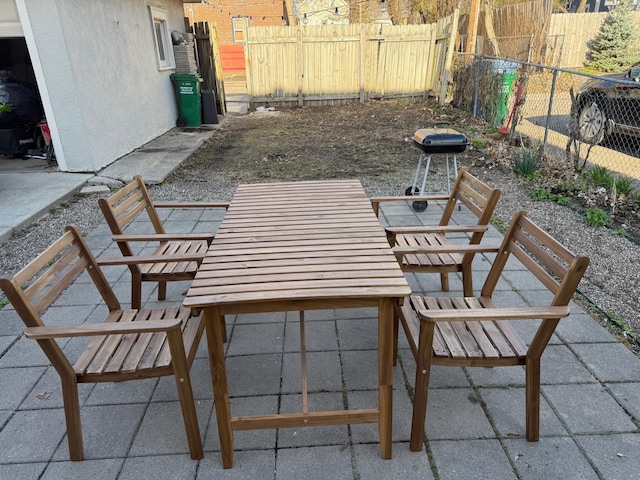 view of patio / terrace with fence and outdoor dining space