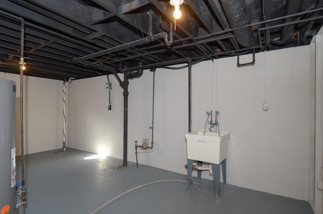 unfinished below grade area featuring water heater