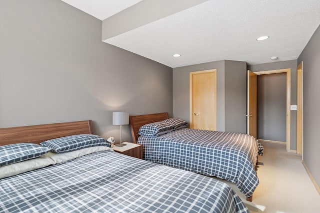 bedroom featuring carpet flooring, recessed lighting, a textured ceiling, and baseboards