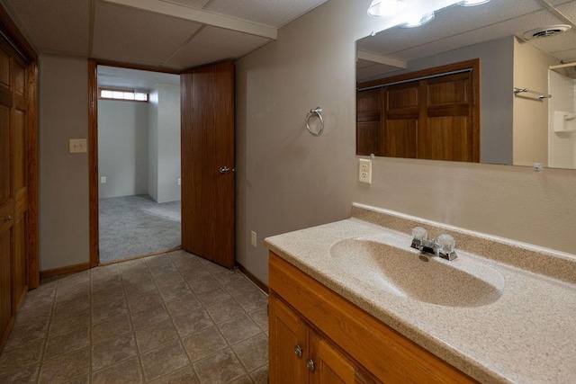 bathroom featuring tile patterned floors, visible vents, and vanity