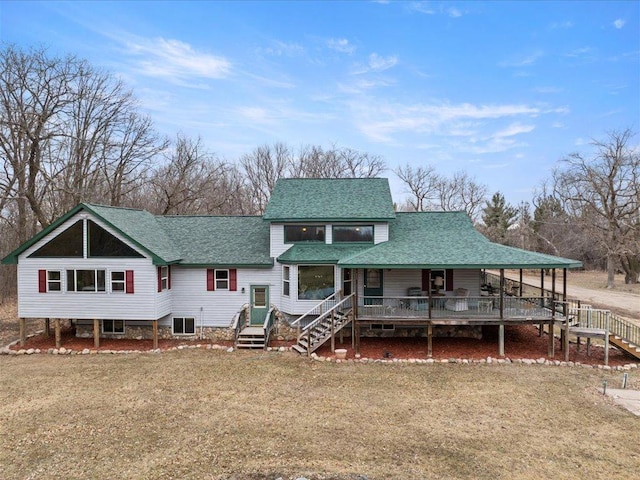 9529- 20th St, Saint Mathias Twp, MN 56449 - back of property featuring a lawn, stairway, central AC, and roof with shingles