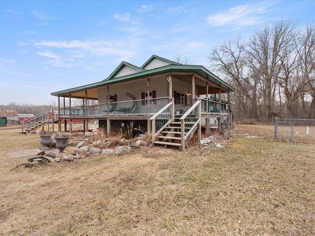9529- 20th St, Saint Mathias Twp, MN 56449 - rear view of property featuring fence, stairway, and a yard