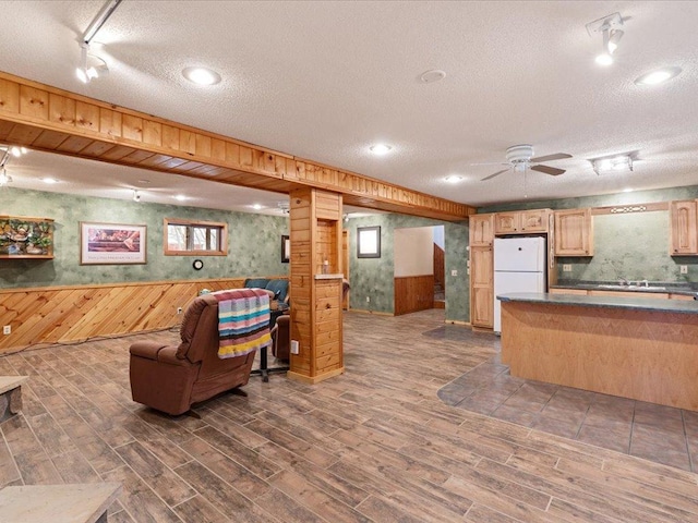 9529- 20th St, Saint Mathias Twp, MN 56449 - kitchen with a textured ceiling, open floor plan, dark wood-style flooring, and freestanding refrigerator