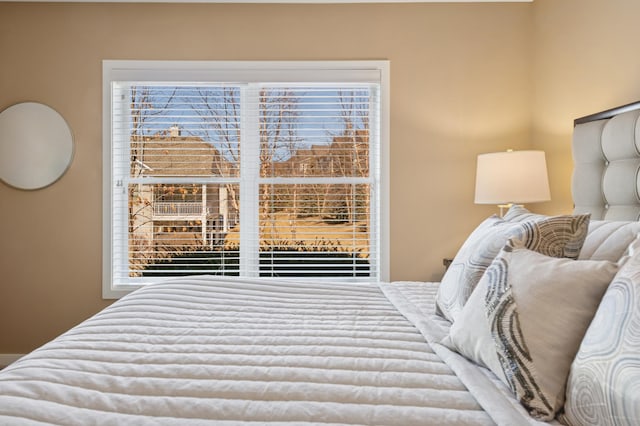 bedroom featuring multiple windows