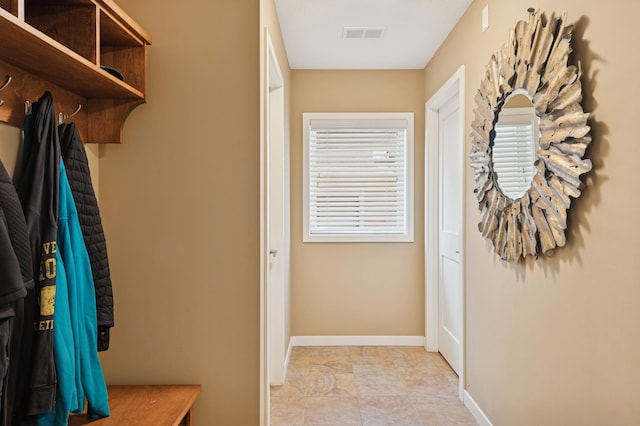 interior space featuring visible vents and baseboards