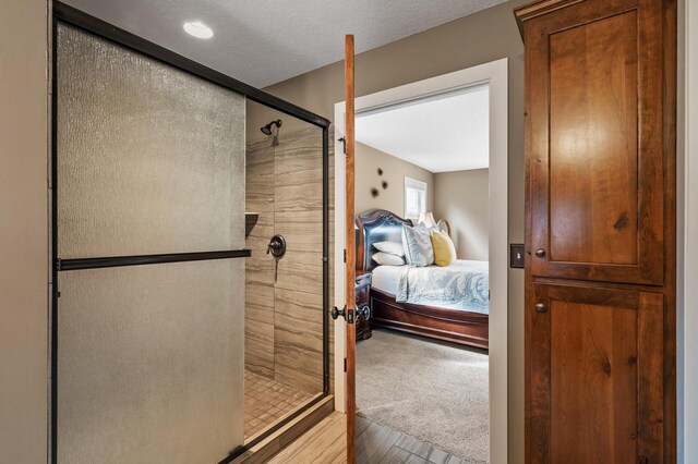bedroom featuring a textured ceiling