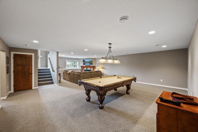 game room featuring a textured ceiling, baseboards, recessed lighting, light carpet, and pool table