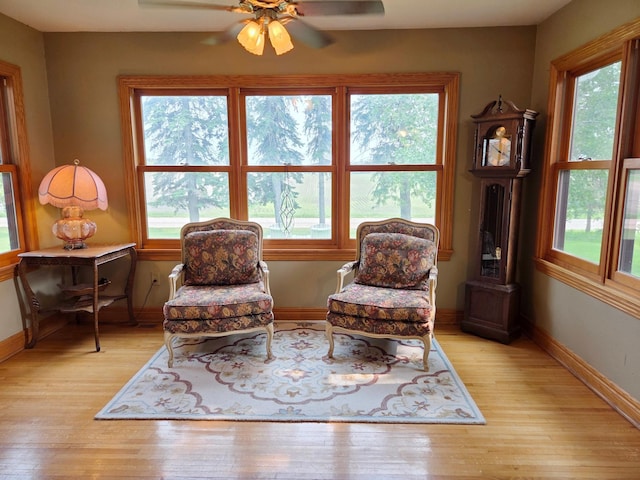 17634 240th St, Hutchinson Twp, MN 55350 - sitting room with light wood finished floors, baseboards, and a ceiling fan
