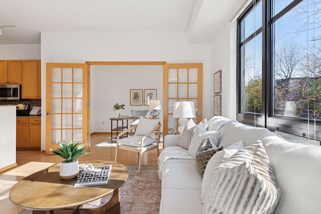 living area featuring light wood finished floors
