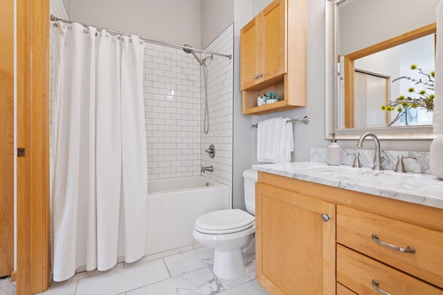 bathroom with vanity, marble finish floor, toilet, and shower / tub combo with curtain