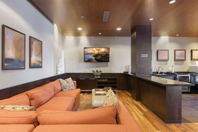 interior space featuring visible vents and a sink